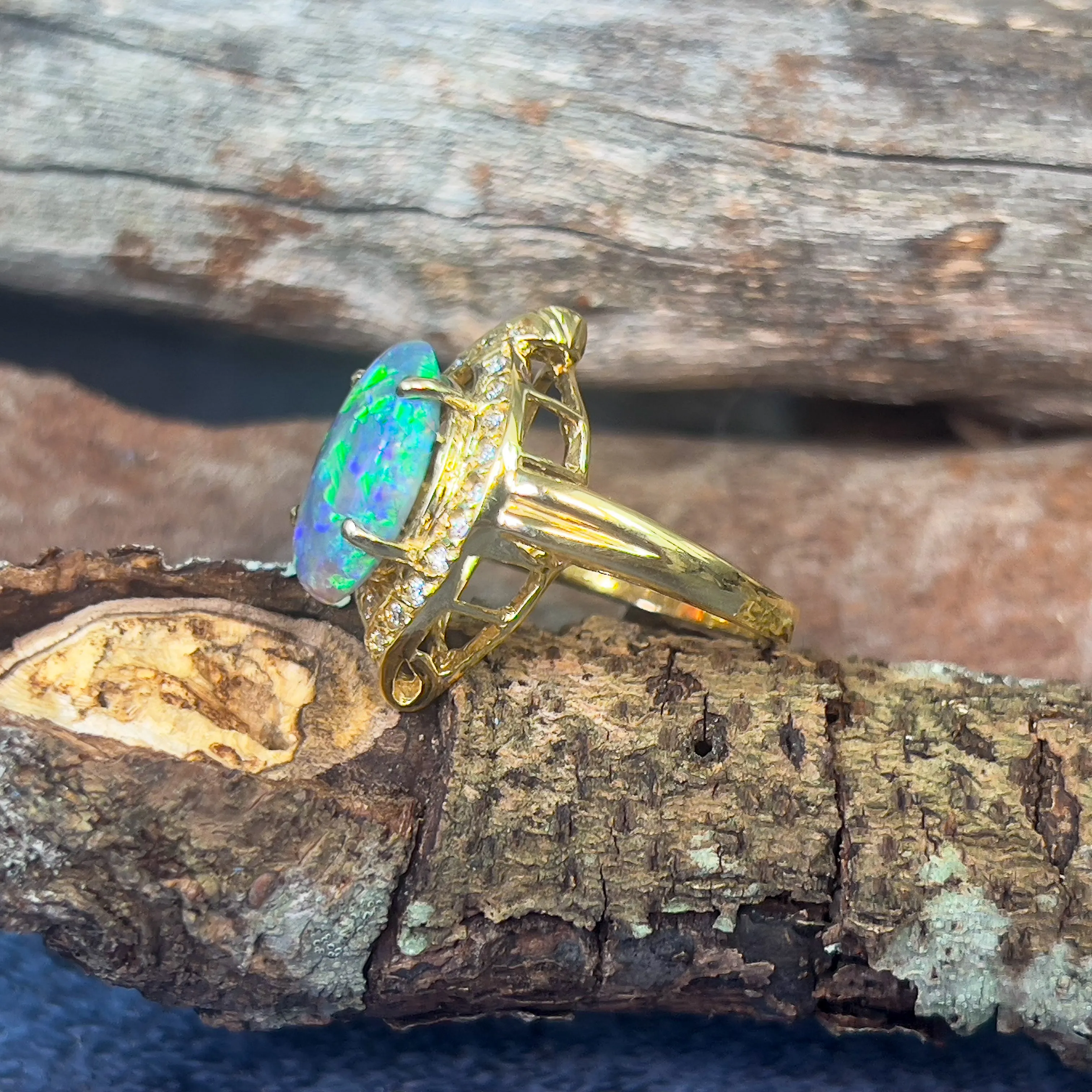 18kt Yellow Gold Black Opal 4ct Green Blue and diamond ring