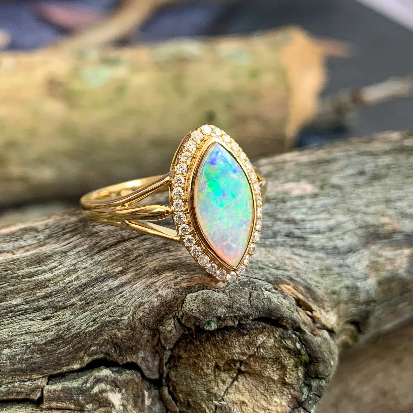 18kt Yellow Gold marquise Light Opal halo Opal engagement ring