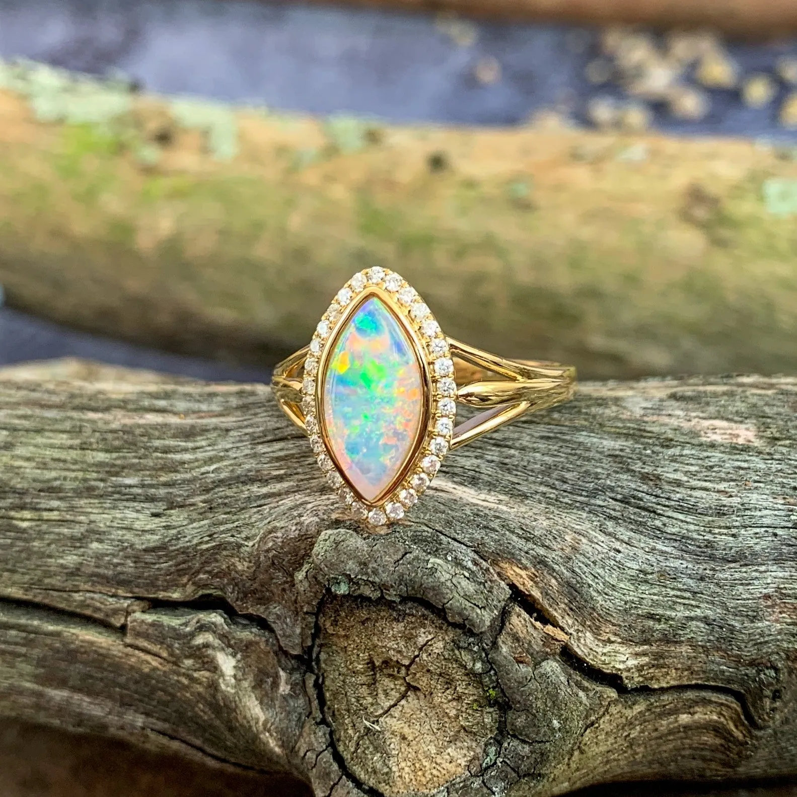 18kt Yellow Gold marquise Light Opal halo Opal engagement ring