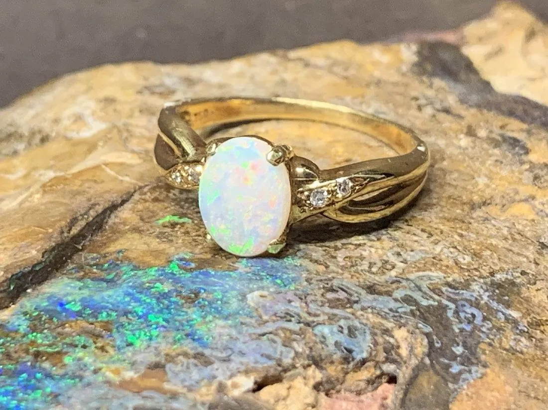 18kt Yellow Gold Opal and Diamond ring