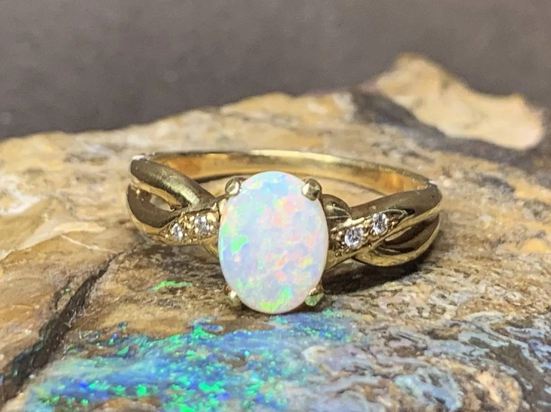 18kt Yellow Gold Opal and Diamond ring