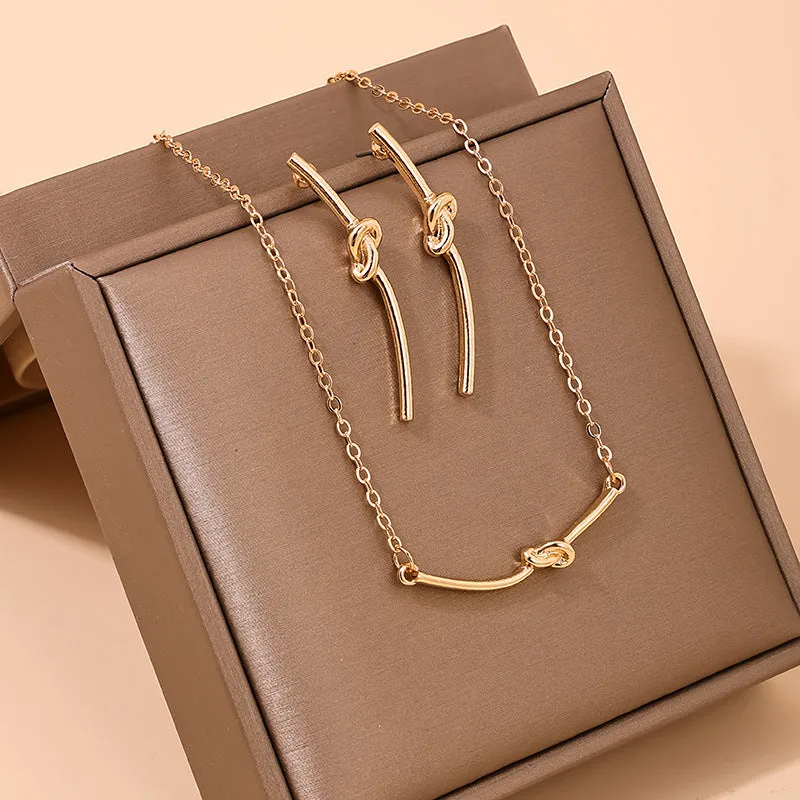 Fashionable Vienna Verve Metal Necklace and Earrings Set with Unique Knot Design