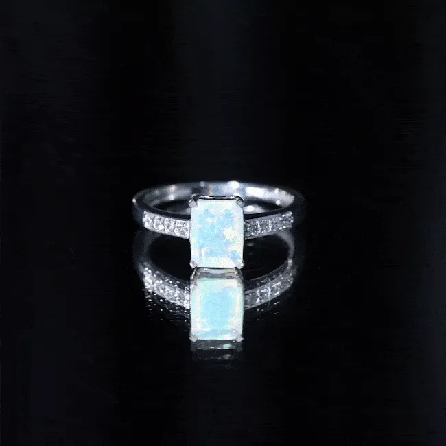 Octagon Cut Ethiopian Opal Solitaire Engagement Ring with Diamond Side Stones