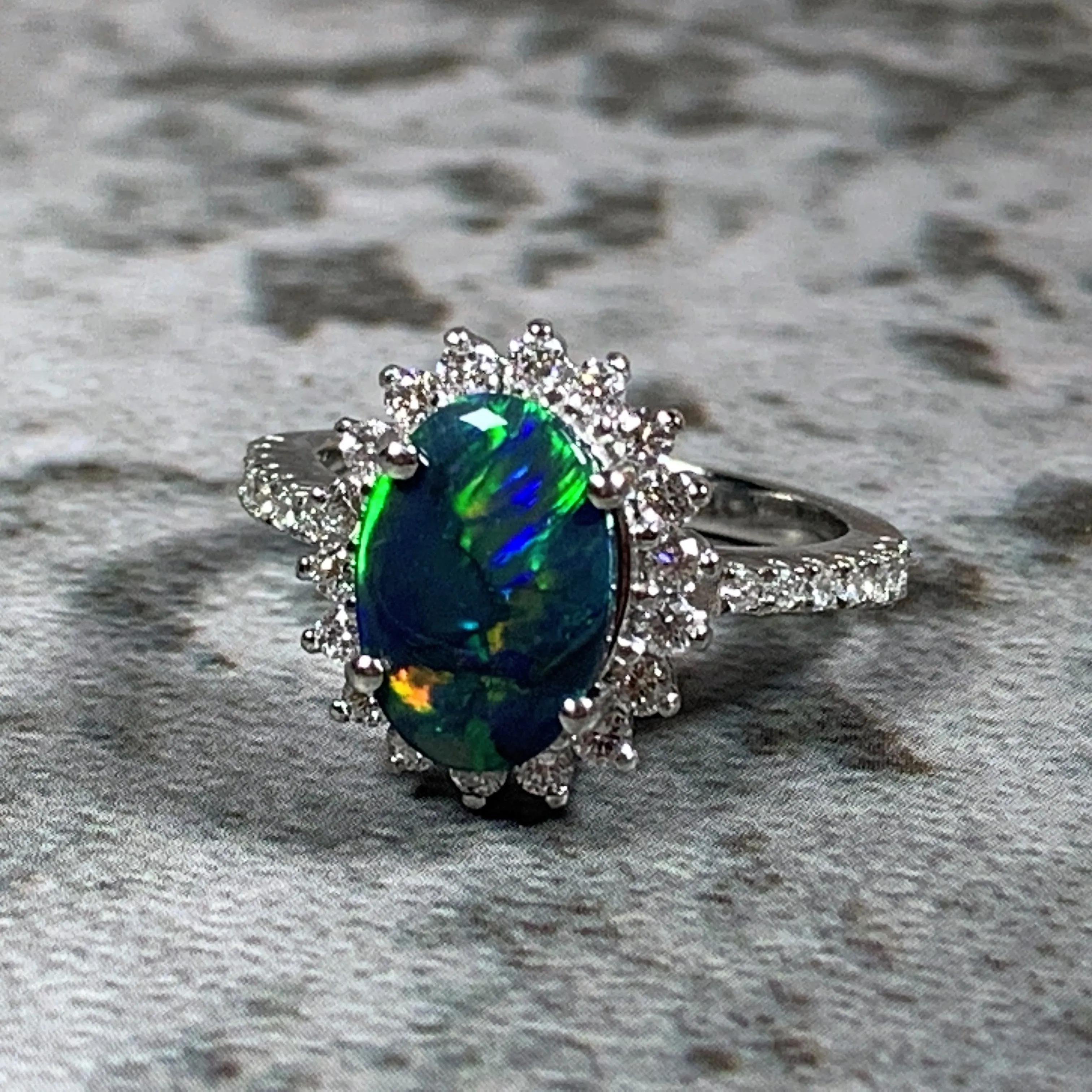 Platinum cluster Black Opal 1.04ct and Diamond ring